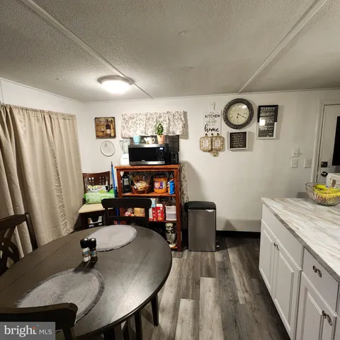 a view of a workspace with furniture