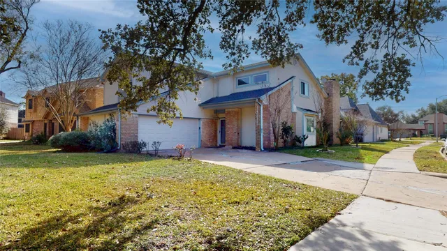 a front view of house with yard