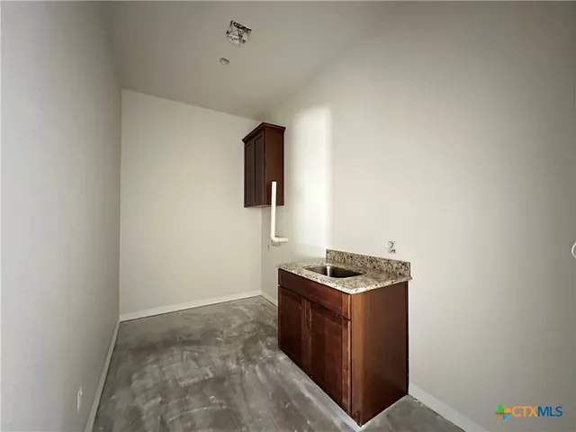 a room with storage and utility