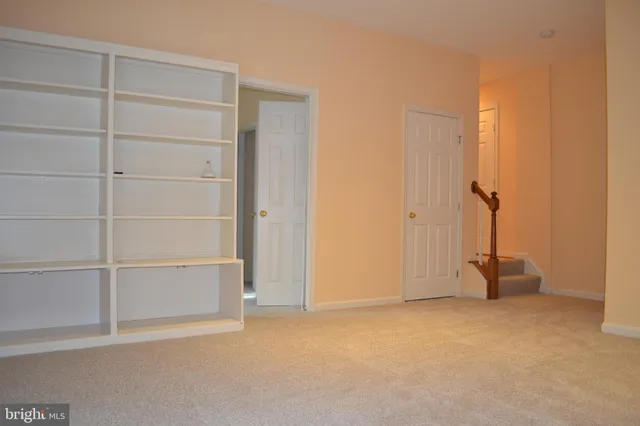 a view of a flat screen tv with wooden floor