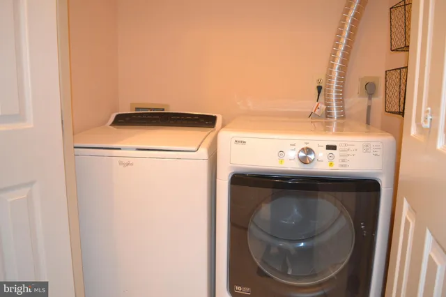 a view of balcony with furniture