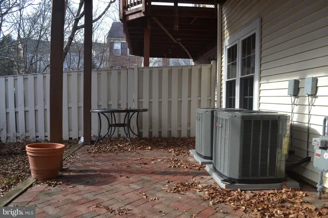 a view of a backyard with pathway