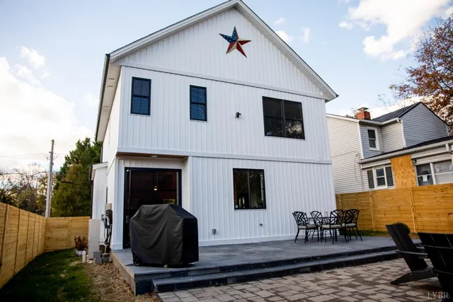 a view of a chairs and table in a room