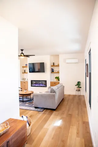 a kitchen with stainless steel appliances granite countertop a sink and cabinets