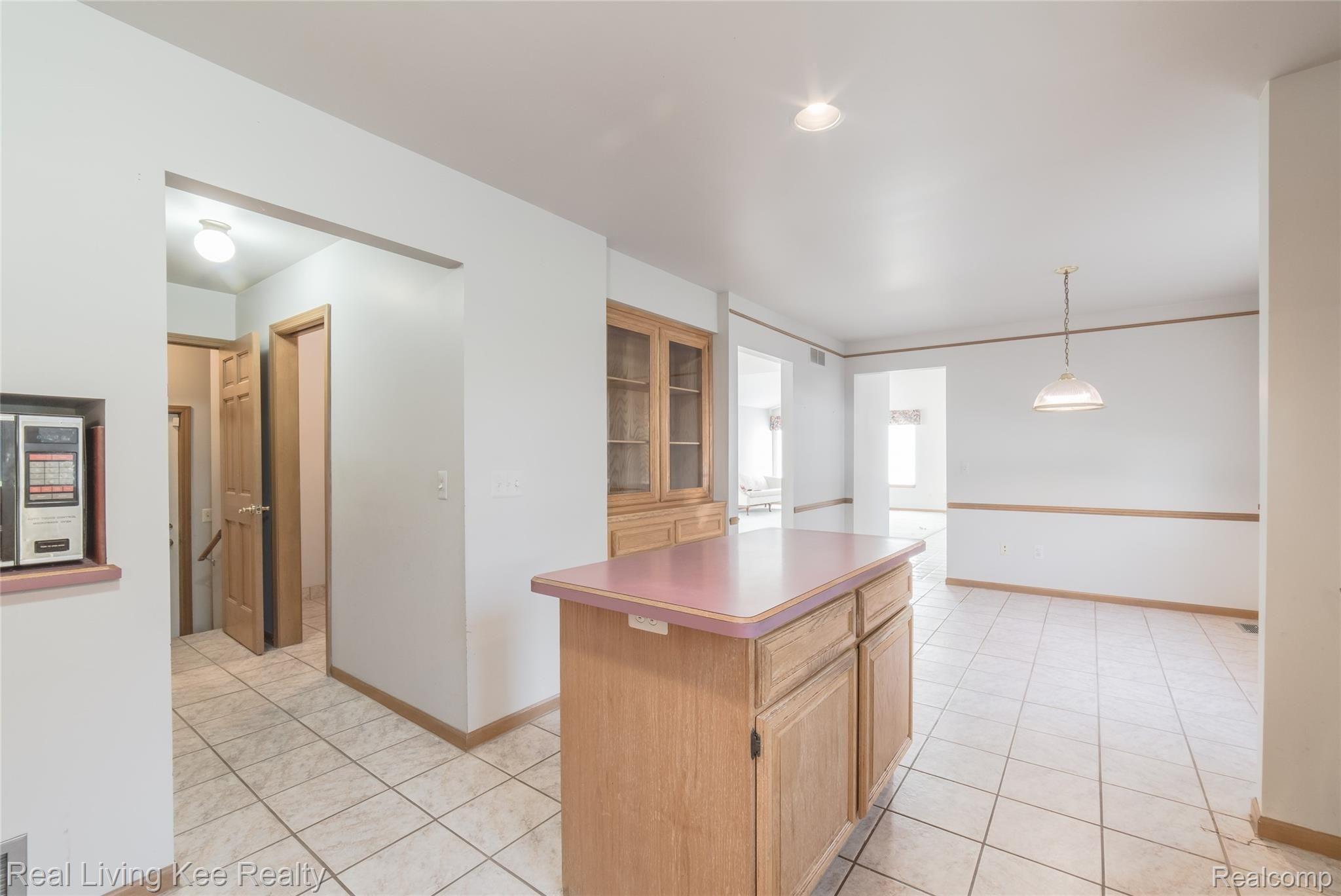 1242 Ruby Avenue Rochester, MI 48309 - Photo 12 of 35 Kitchen off the laundry area, walk in pantry,powder room, LL & garage