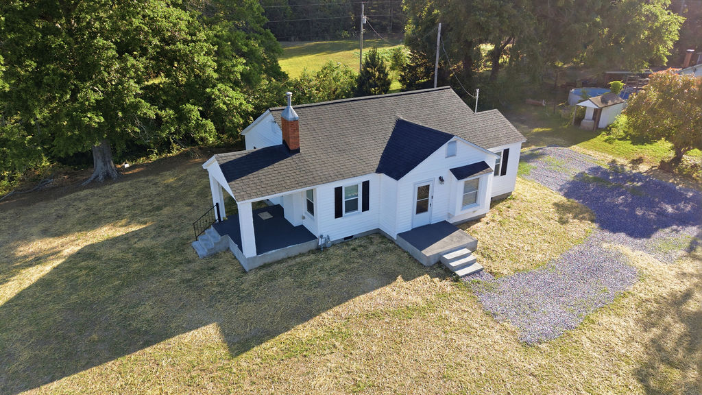 7604 Highway 252 Honea Path, SC 29654 - Photo 29 of 33 This charming home offers a welcoming facade with a covered porch and traditional architectural details.