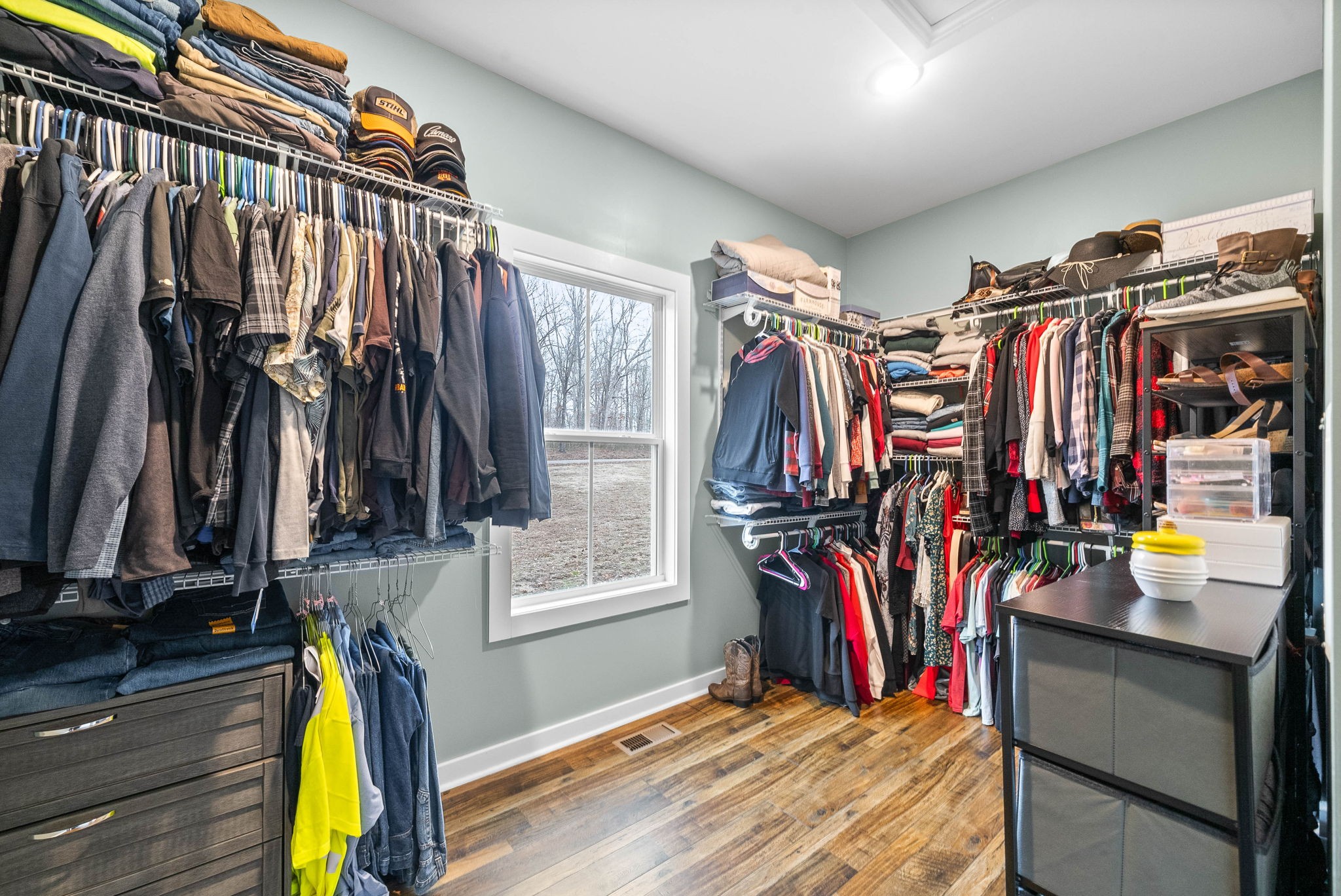 501 Mcelhiney Road Dickson, TN 37055 - Photo 23 of 47 a view of walk in closet with clothes and shoes