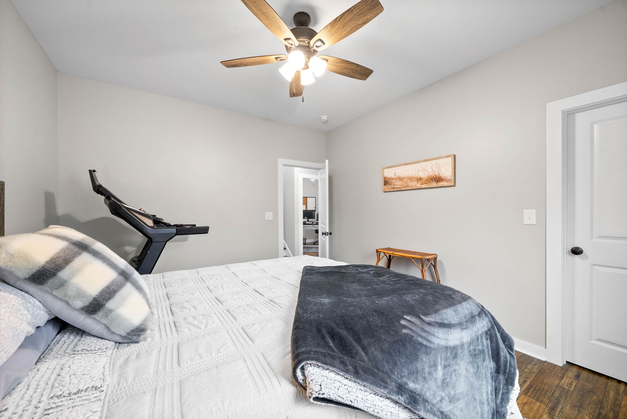501 Mcelhiney Road Dickson, TN 37055 - Photo 26 of 47 a bedroom with a bed and a chandelier
