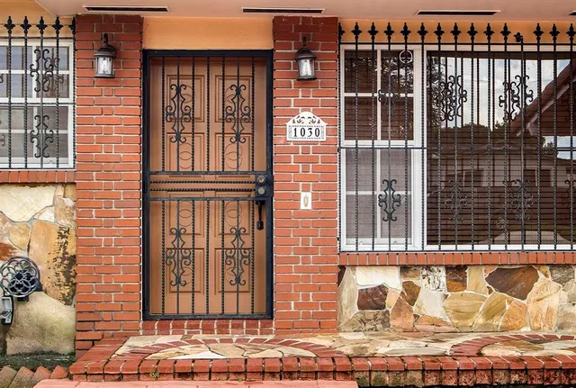 a front view of a building with a street
