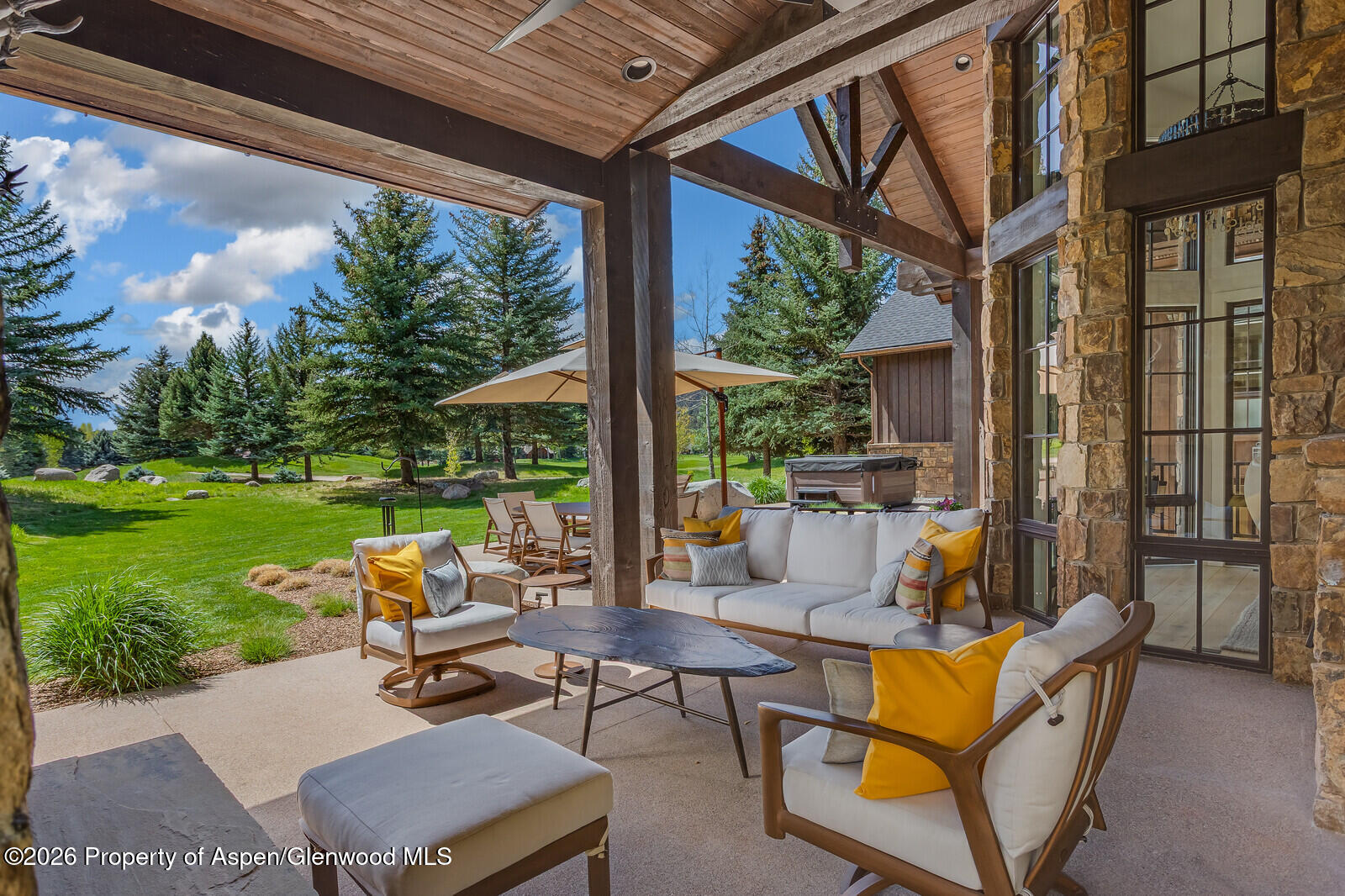 38 Diamond A Ranch Road Carbondale, CO 81623 - Photo 55 of 158 Backyard, Patio with Fireplace, Dining