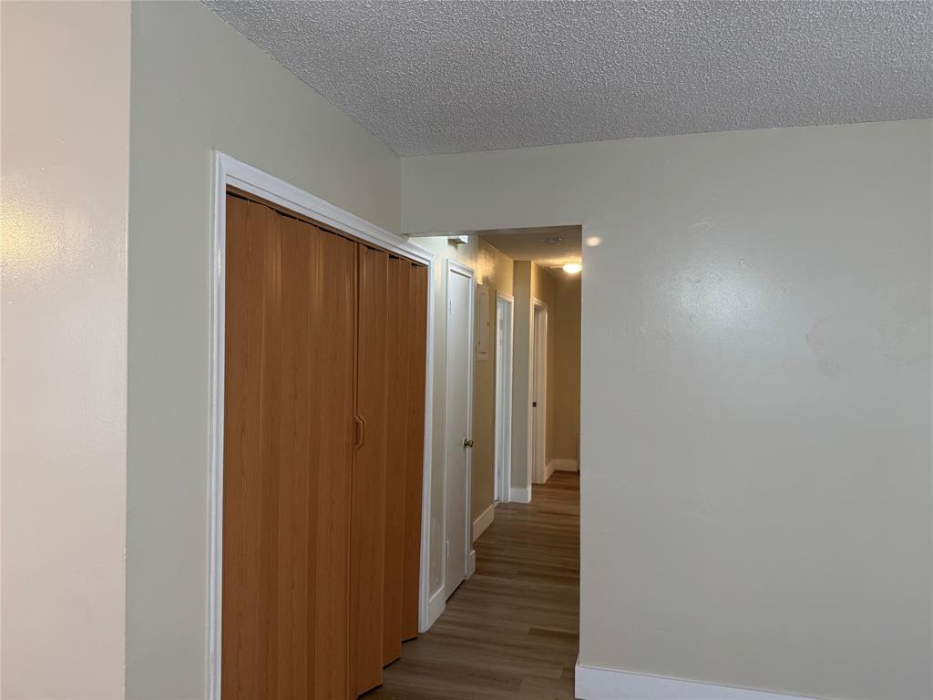 2156 Northwest 66th Street Miami, FL 33147 - Photo 12 of 29 a view of gallery with wooden floor