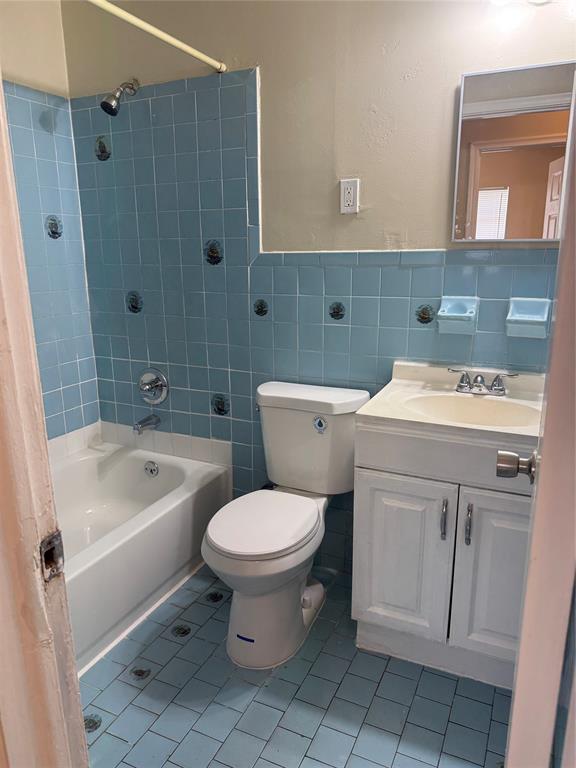 2156 Northwest 66th Street Miami, FL 33147 - Photo 21 of 29 a bathroom with a sink toilet and shower