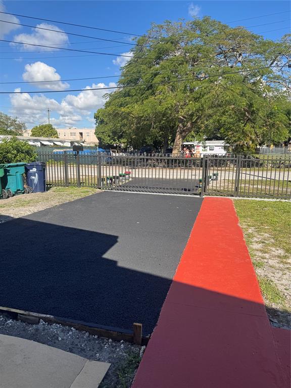 2156 Northwest 66th Street Miami, FL 33147 - Photo 27 of 29 a view of swimming pool outdoor seating and city view