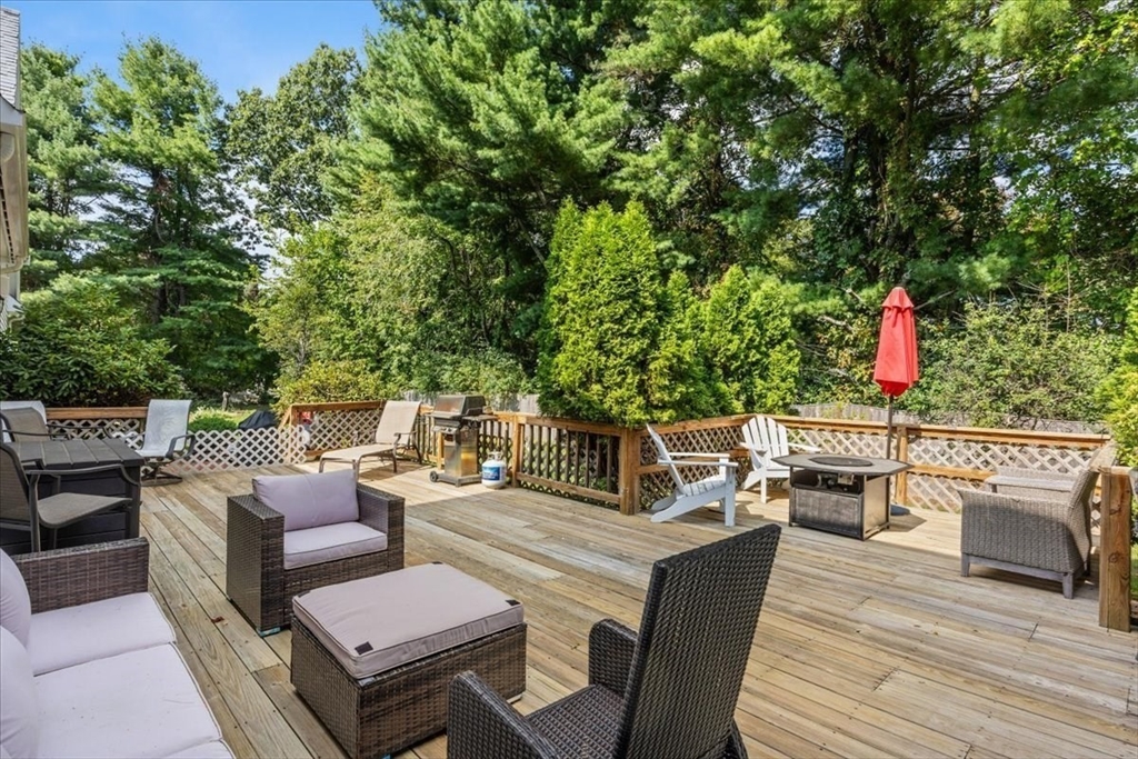 84 Juniper Ridge Road Westwood, MA 02090 - Photo 24 of 28 a terrace of a house with outdoor seating