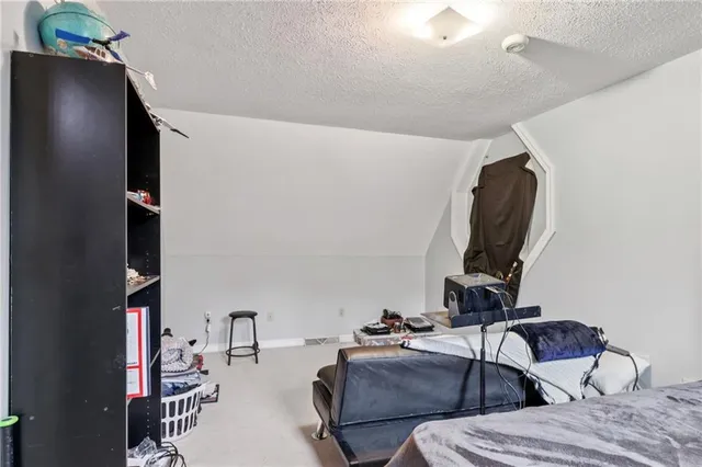 a bathroom with a sink and a shower