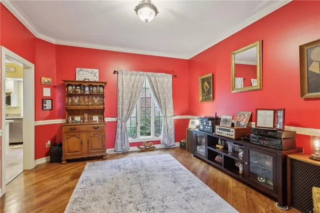 a living room with furniture fireplace and flat screen tv