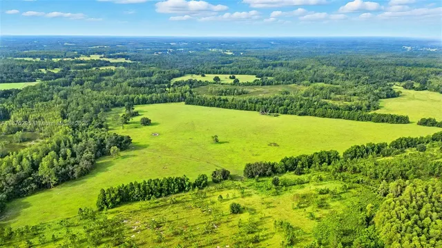 a view of a lake with a big yard