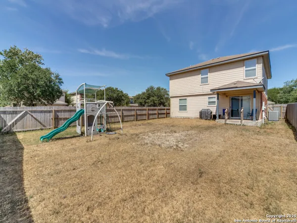 a view of a house with a patio