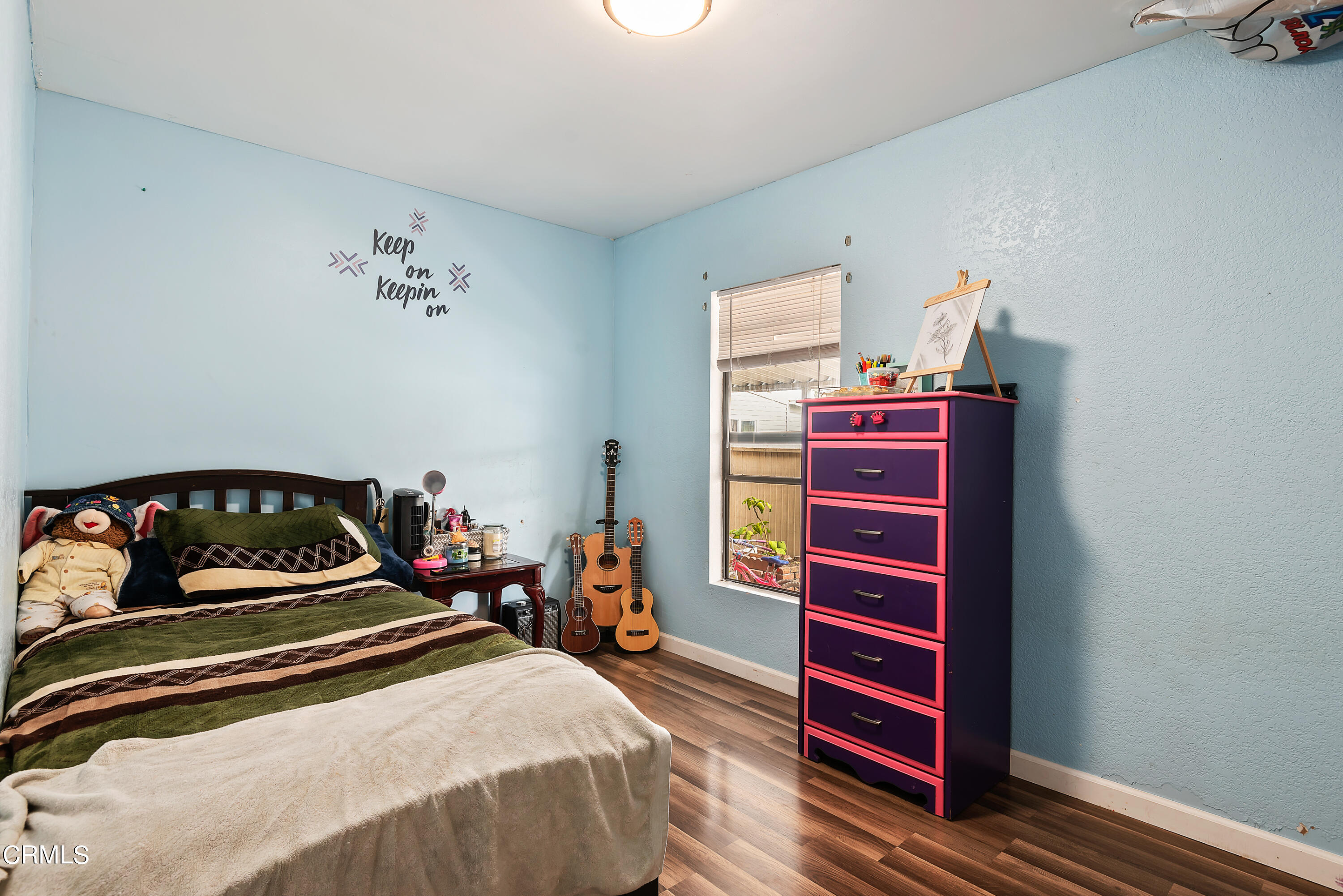 140 Rainbow Drive, Unit 162 Oxnard, CA 93033 - Photo 13 of 19 a bedroom with a bed and a dresser in it