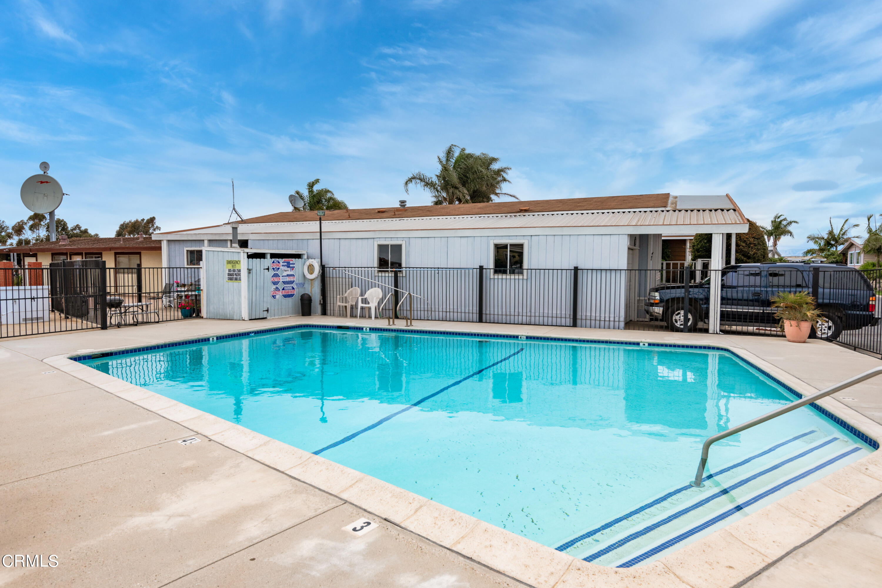 140 Rainbow Drive, Unit 162 Oxnard, CA 93033 - Photo 18 of 19 a view of a house with pool