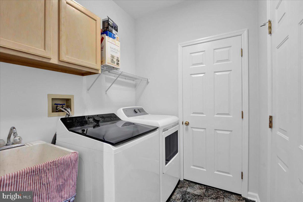 550 Betcher Road Trappe, PA 19426 - Photo 23 of 71 a kitchen with stainless steel appliances granite countertop a sink stove and cabinets
