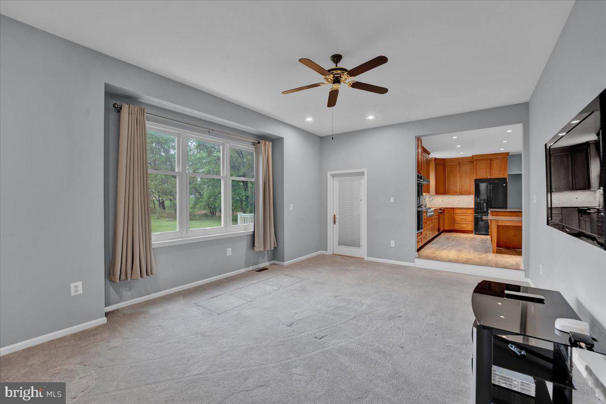 550 Betcher Road Trappe, PA 19426 - Photo 24 of 71 a bedroom with furniture window and a ceiling fan
