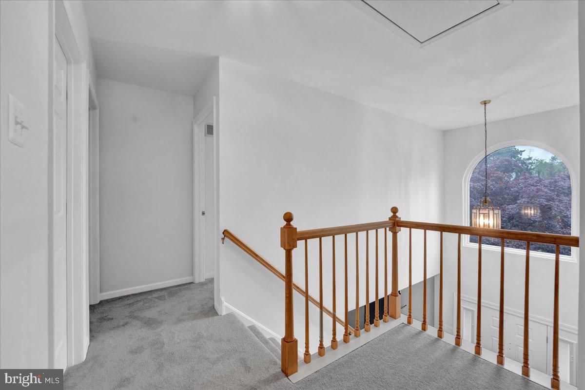 550 Betcher Road Trappe, PA 19426 - Photo 38 of 71 a view of a hallway with a window and stairs