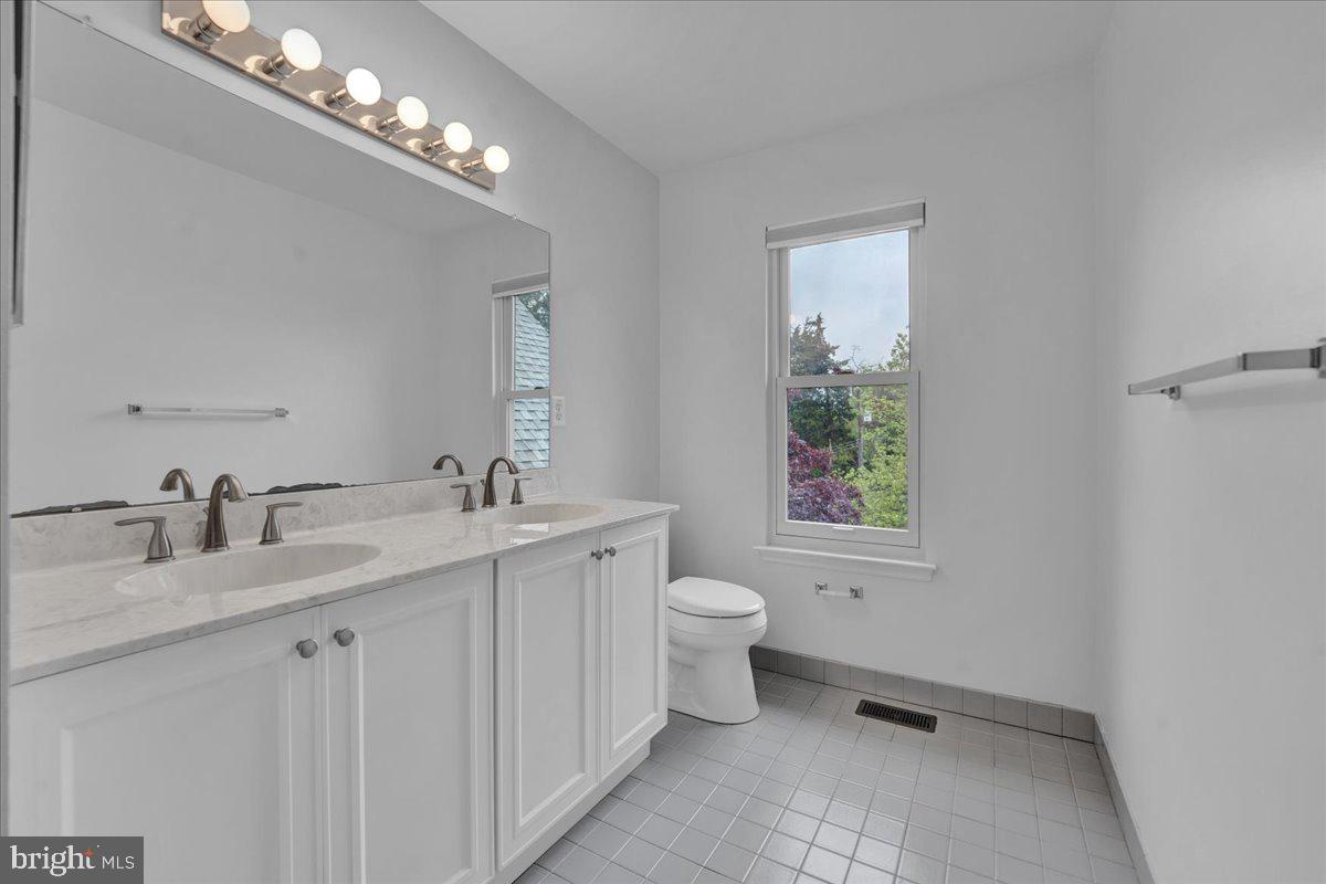 550 Betcher Road Trappe, PA 19426 - Photo 43 of 71 a bathroom with a toilet sink and mirror