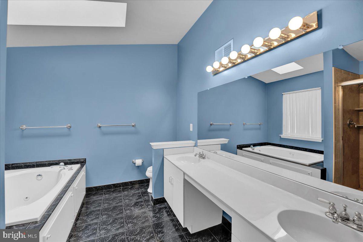 550 Betcher Road Trappe, PA 19426 - Photo 50 of 71 a bathroom with a sink a toilet and a bathtub