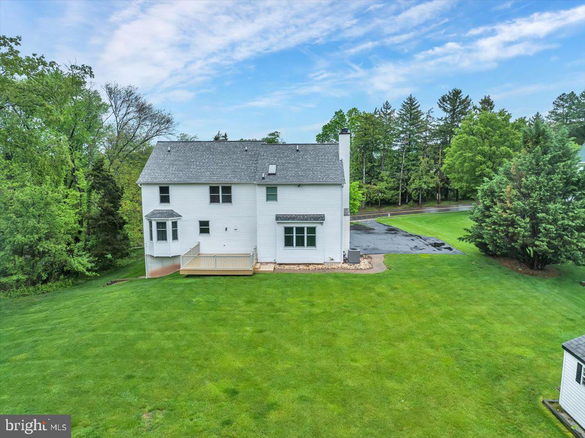 550 Betcher Road Trappe, PA 19426 - Photo 64 of 71 a view of a house with a big yard potted plants and large tree