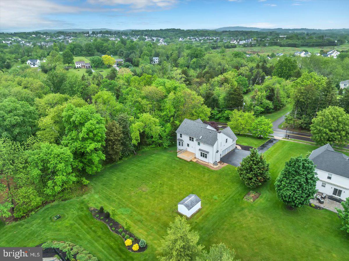 550 Betcher Road Trappe, PA 19426 - Photo 66 of 71 a view of a lush green outdoor space with a lake view and mountain view