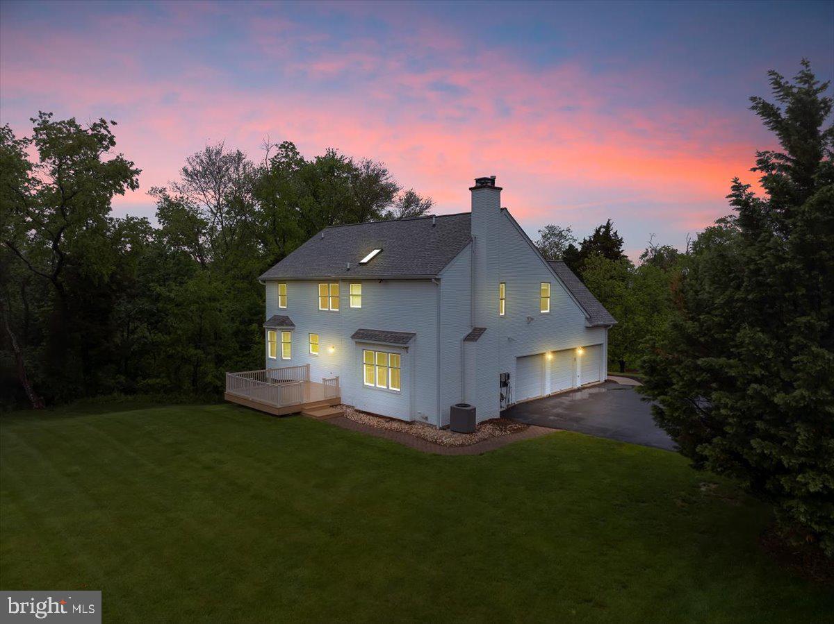 550 Betcher Road Trappe, PA 19426 - Photo 70 of 71 a front view of a house with a yard and trees