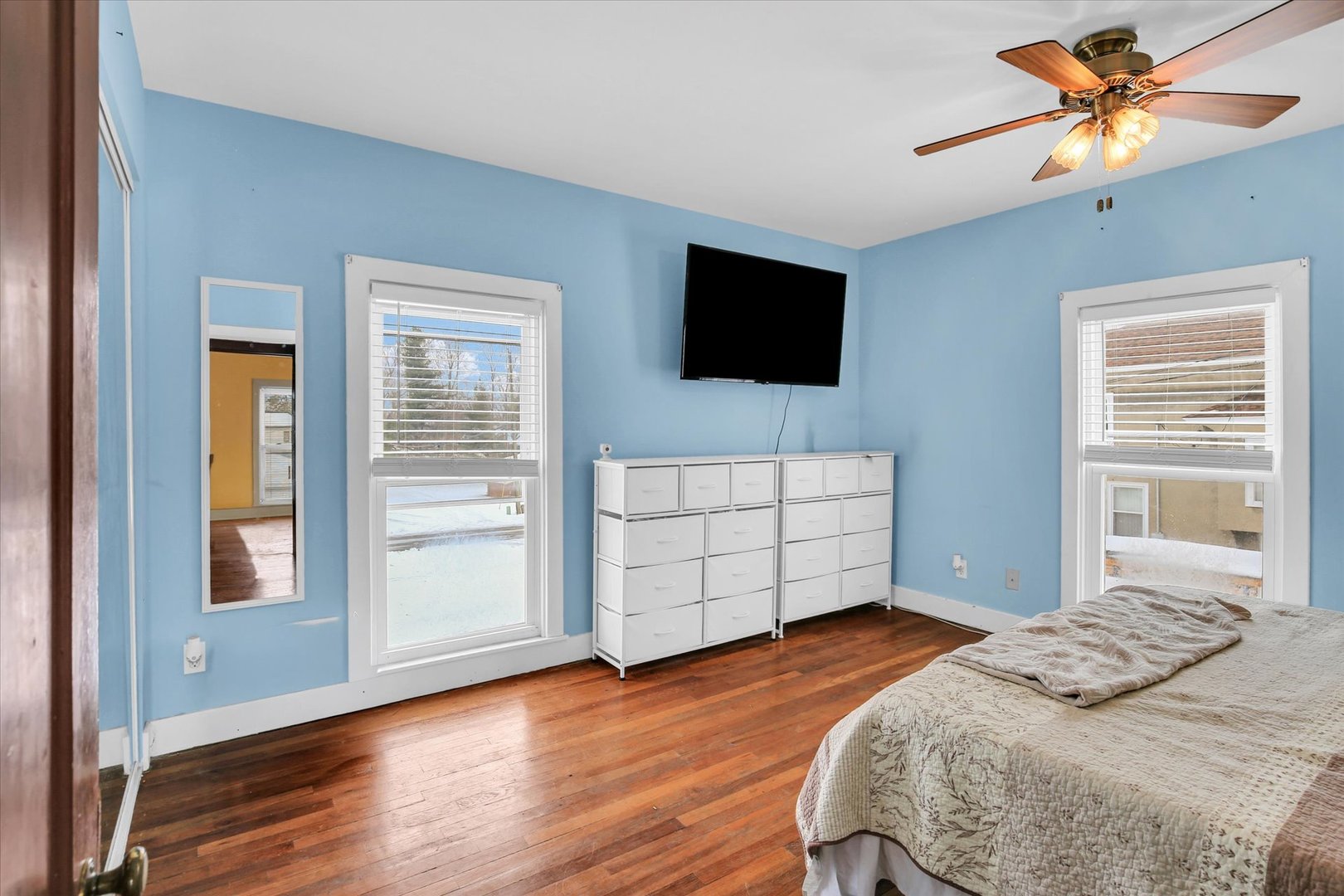 110 East Barker Street Tuscola, IL 61953 - Photo 15 of 32 a bedroom with a bed and a flat screen tv