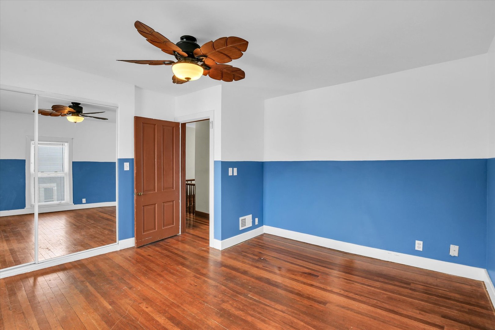 110 East Barker Street Tuscola, IL 61953 - Photo 21 of 32 a view of empty room with wooden floor
