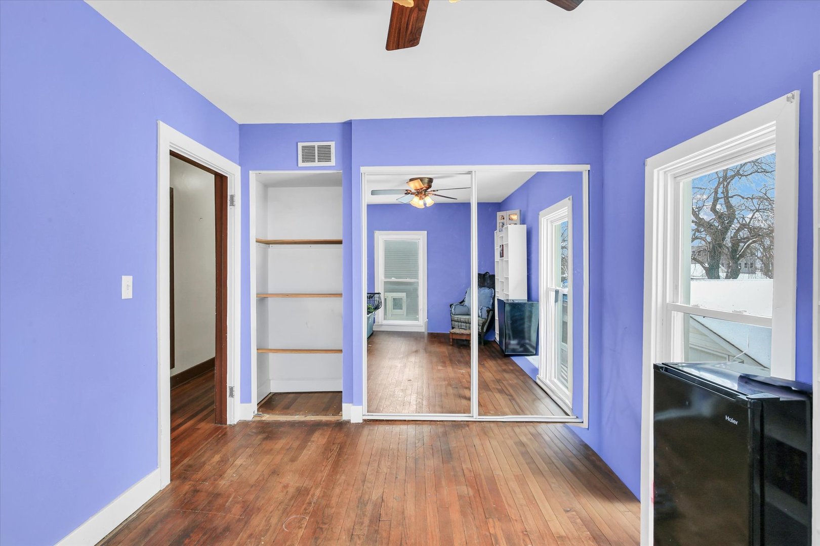 110 East Barker Street Tuscola, IL 61953 - Photo 23 of 32 a view of a hallway with wooden floor and staircase