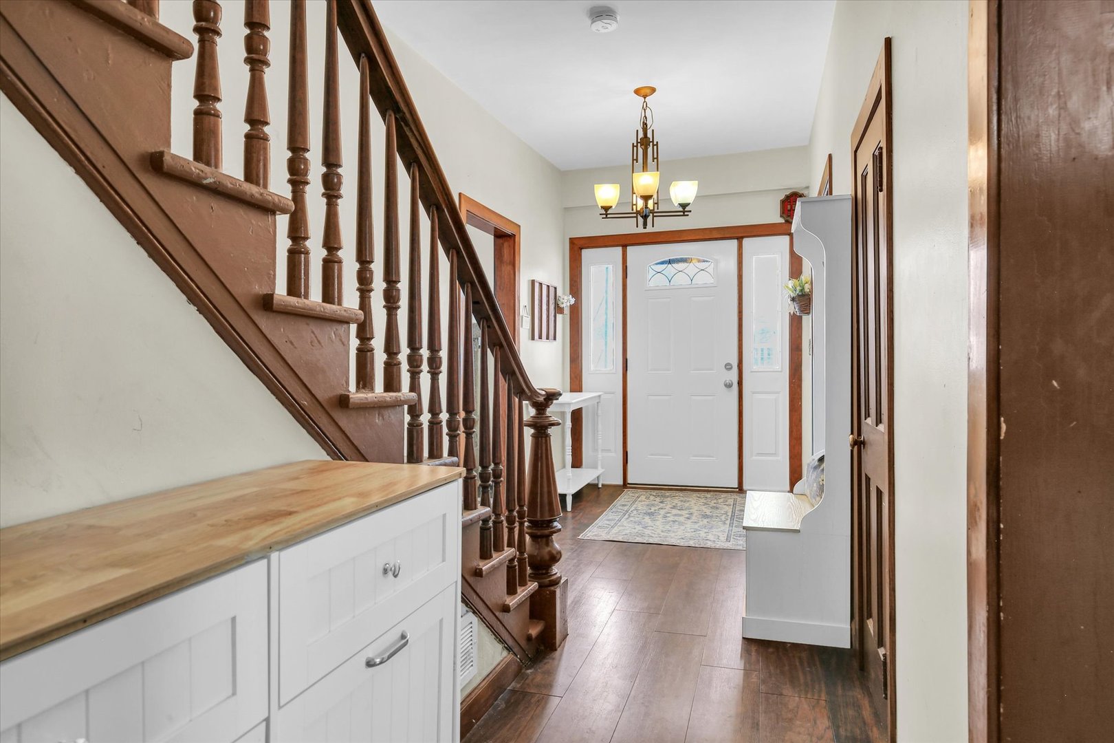 110 East Barker Street Tuscola, IL 61953 - Photo 24 of 32 a view of staircase with wooden floor and staircase