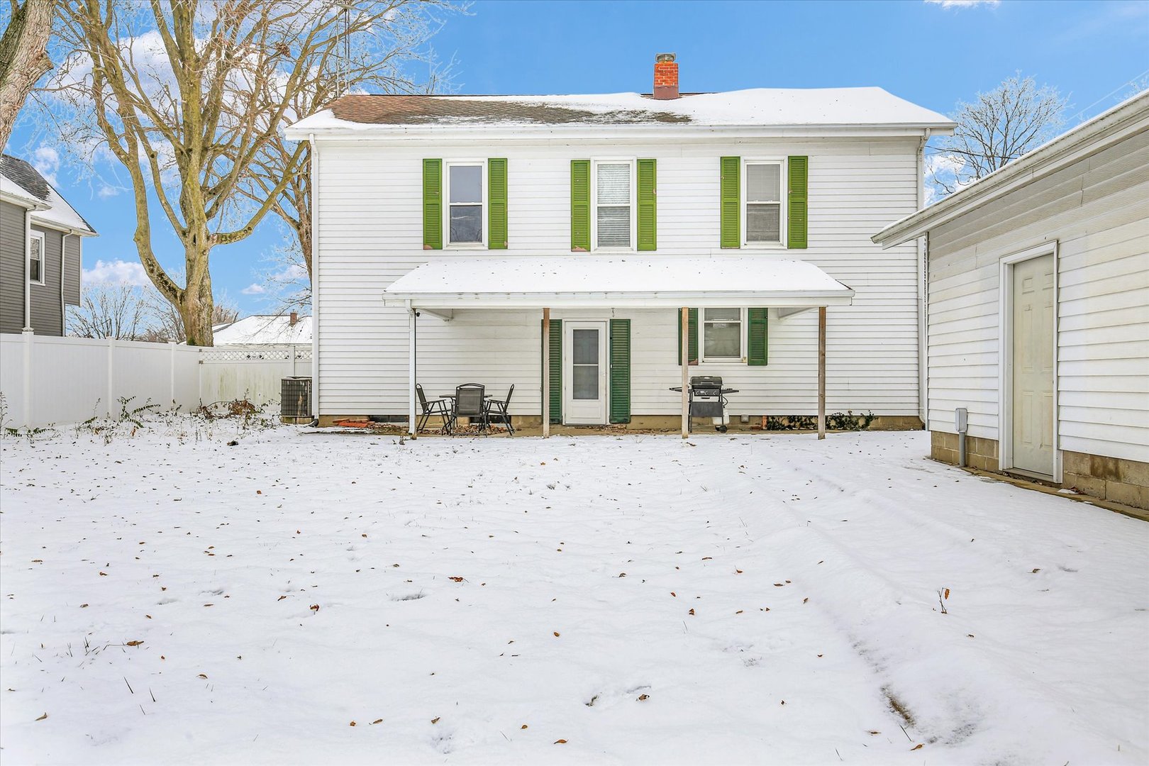 110 East Barker Street Tuscola, IL 61953 - Photo 30 of 32 a front view of a house with a yard