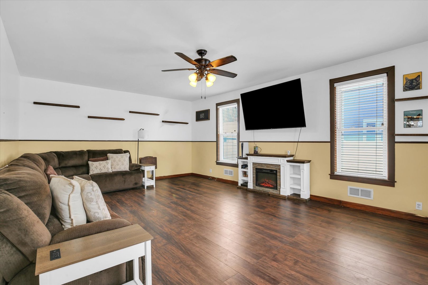 110 East Barker Street Tuscola, IL 61953 - Photo 5 of 32 a living room with furniture and a flat screen tv