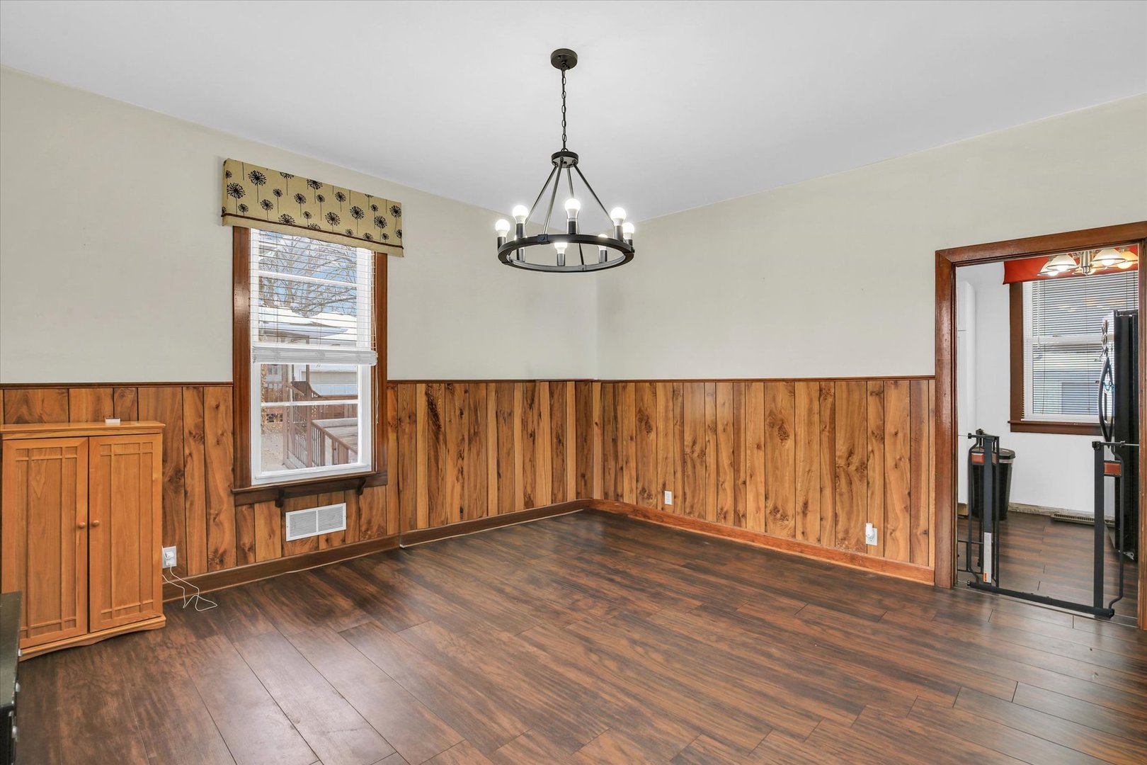 110 East Barker Street Tuscola, IL 61953 - Photo 8 of 32 wooden floor in an empty room with a window