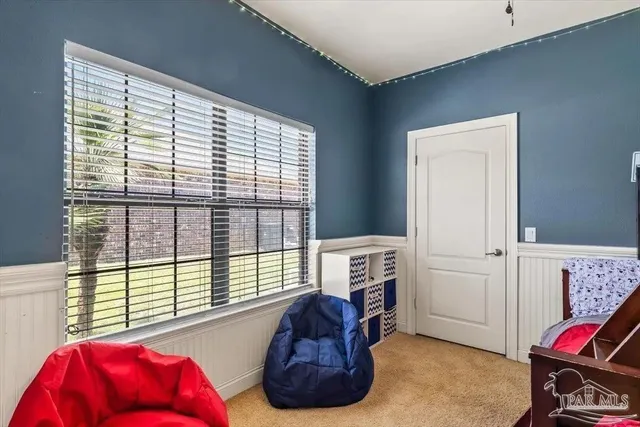 a view of storage and utility room with washer and dryer