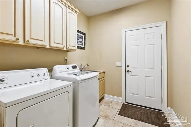 a living room with furniture a fireplace and a floor to ceiling window
