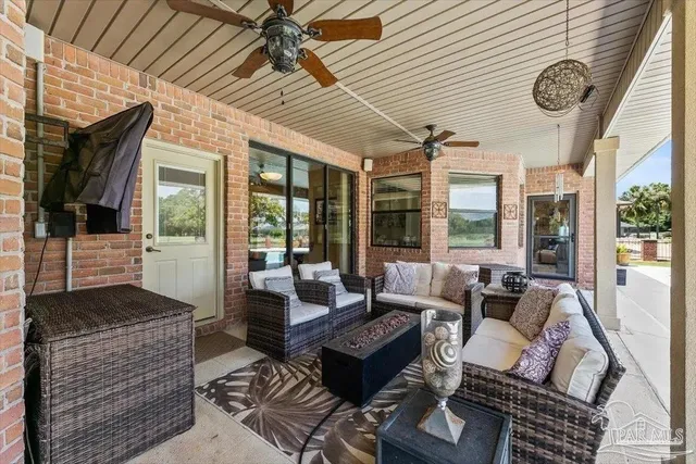 a view of a swimming pool with a patio