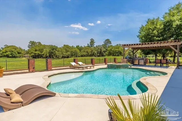 a view of outdoor space yard swimming pool and patio
