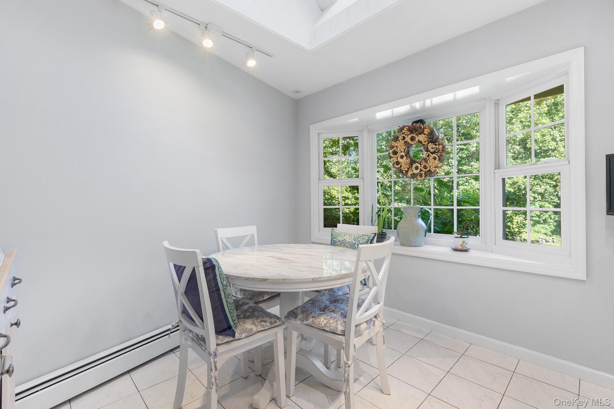 7 Byram Meadows Road Armonk, NY 10504 - Photo 11 of 32 a view of a dining room with furniture window and outside view