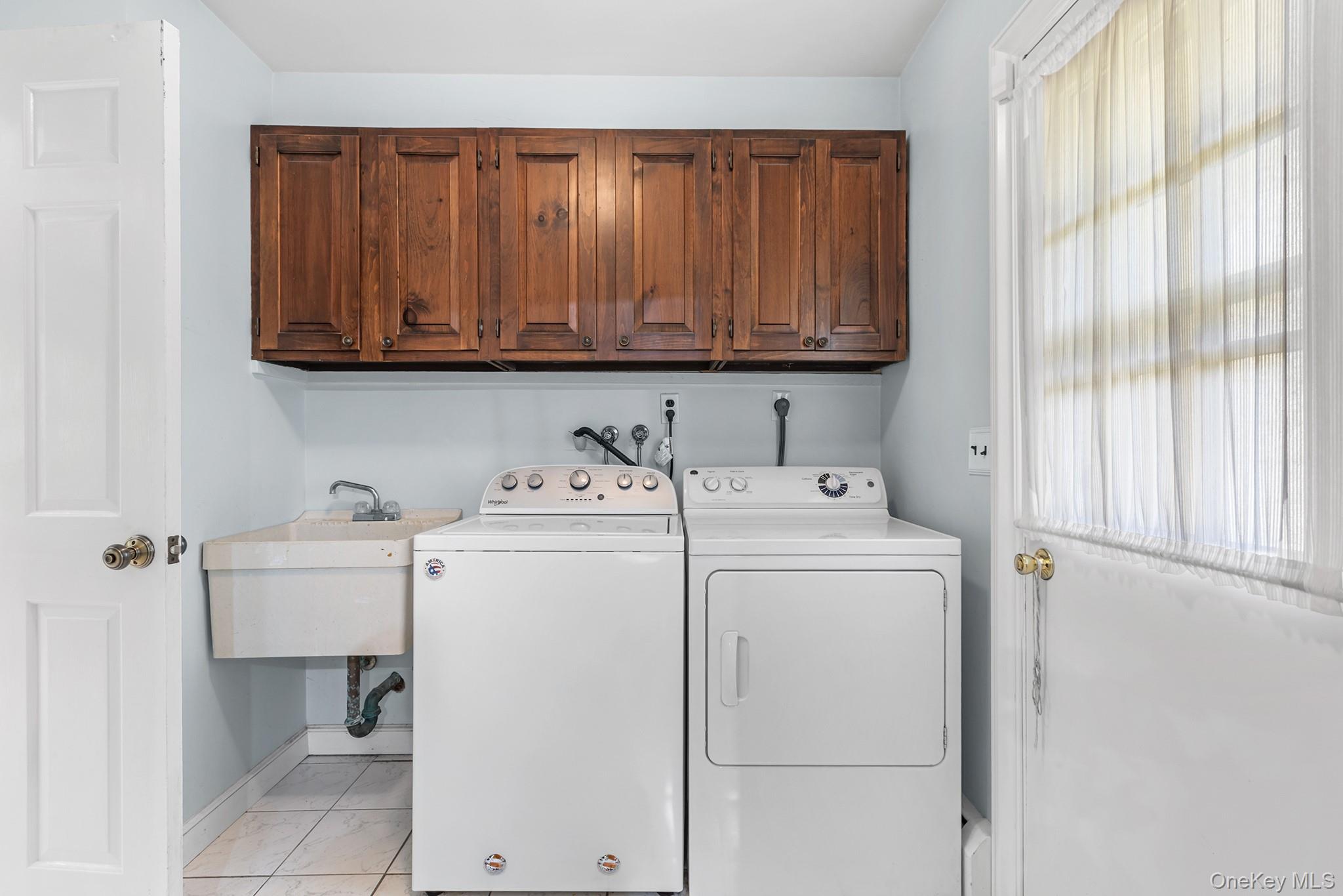 7 Byram Meadows Road Armonk, NY 10504 - Photo 12 of 32 a utility room with dryer and washer