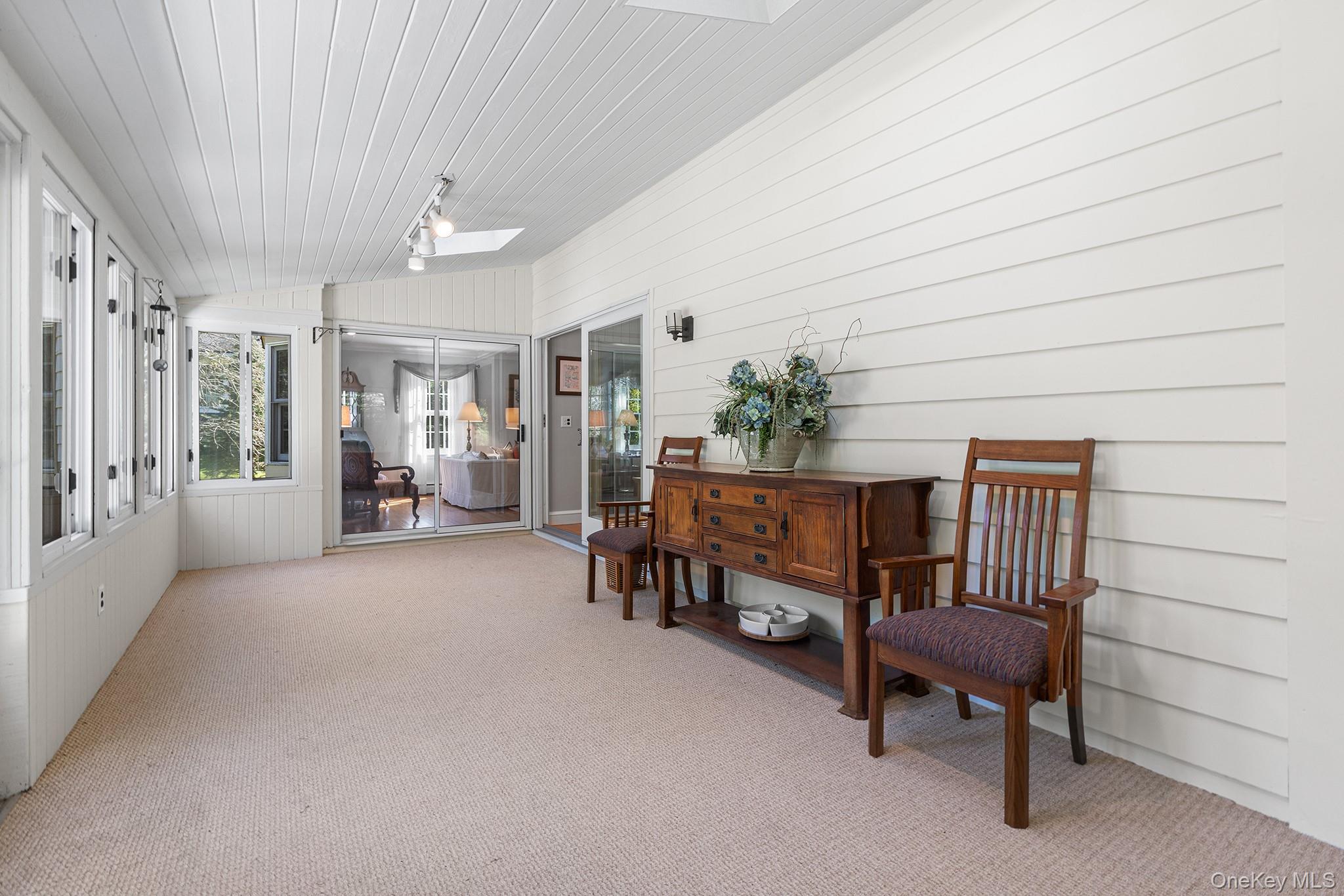 7 Byram Meadows Road Armonk, NY 10504 - Photo 17 of 32 a living room with furniture and a chair