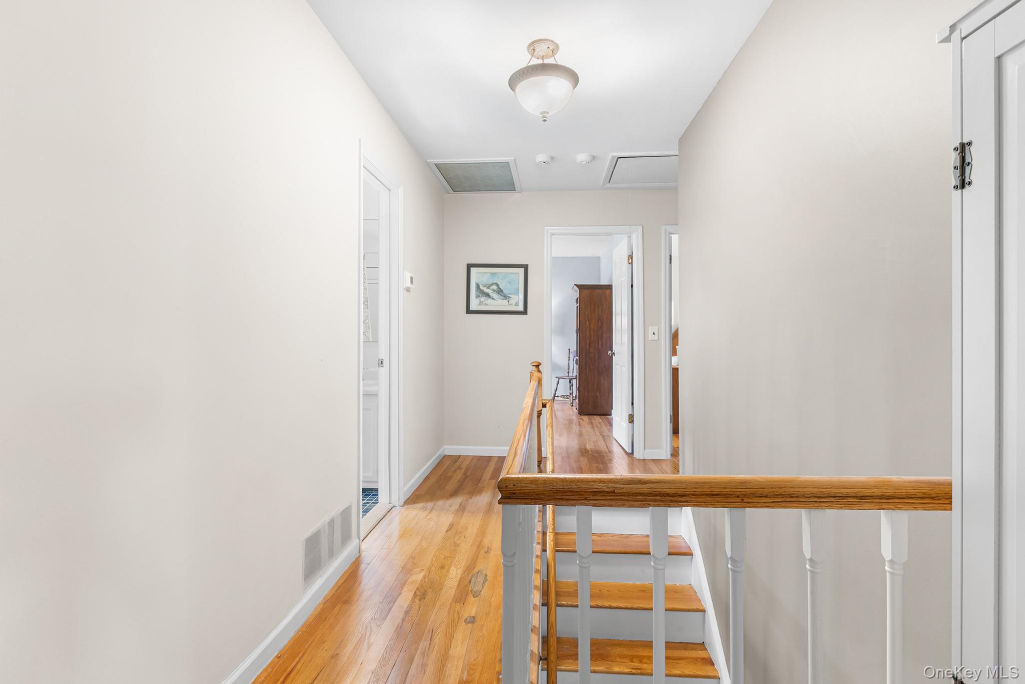 7 Byram Meadows Road Armonk, NY 10504 - Photo 19 of 32 a view of a hallway with a large window