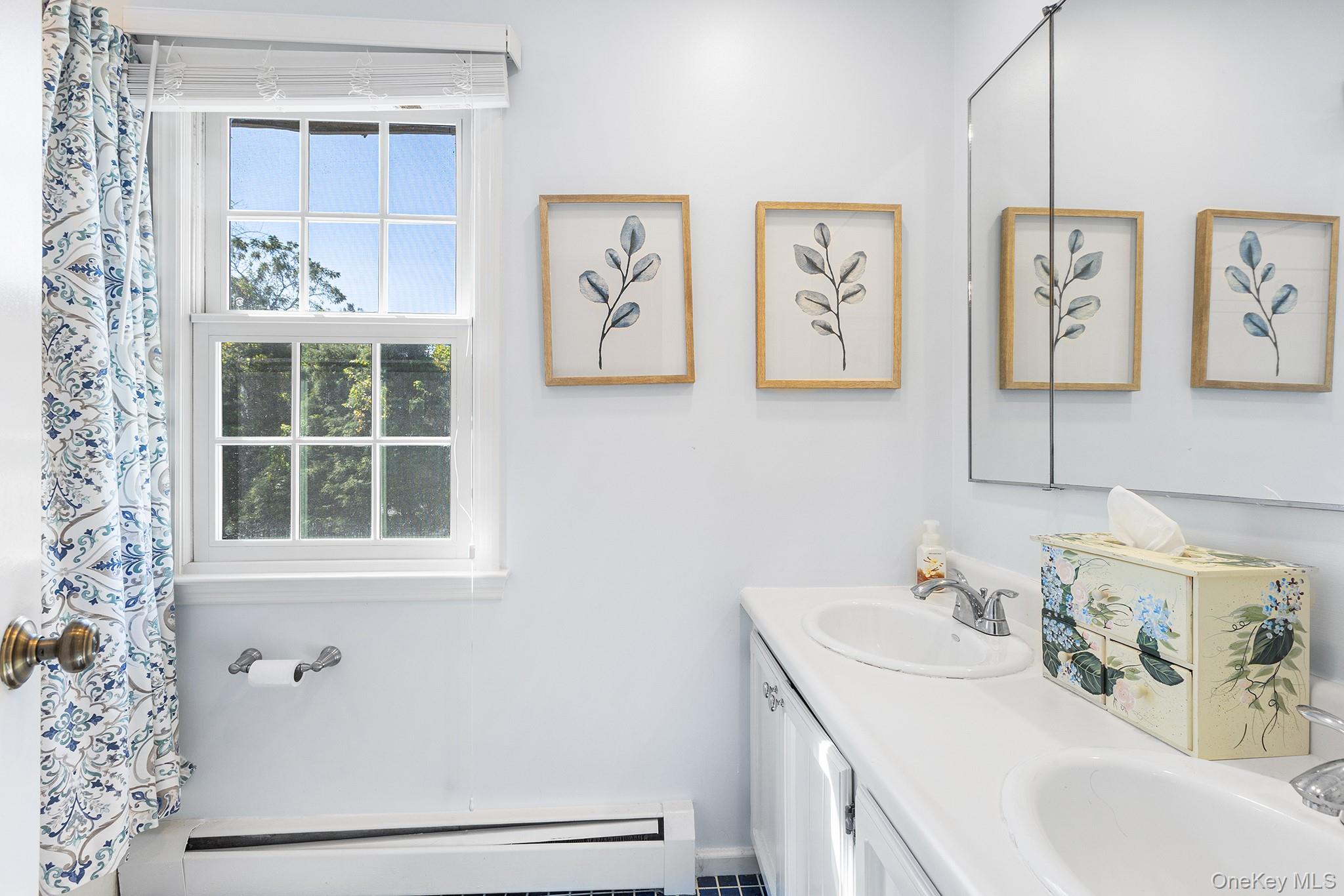 7 Byram Meadows Road Armonk, NY 10504 - Photo 21 of 32 a bathroom with a sink and a window