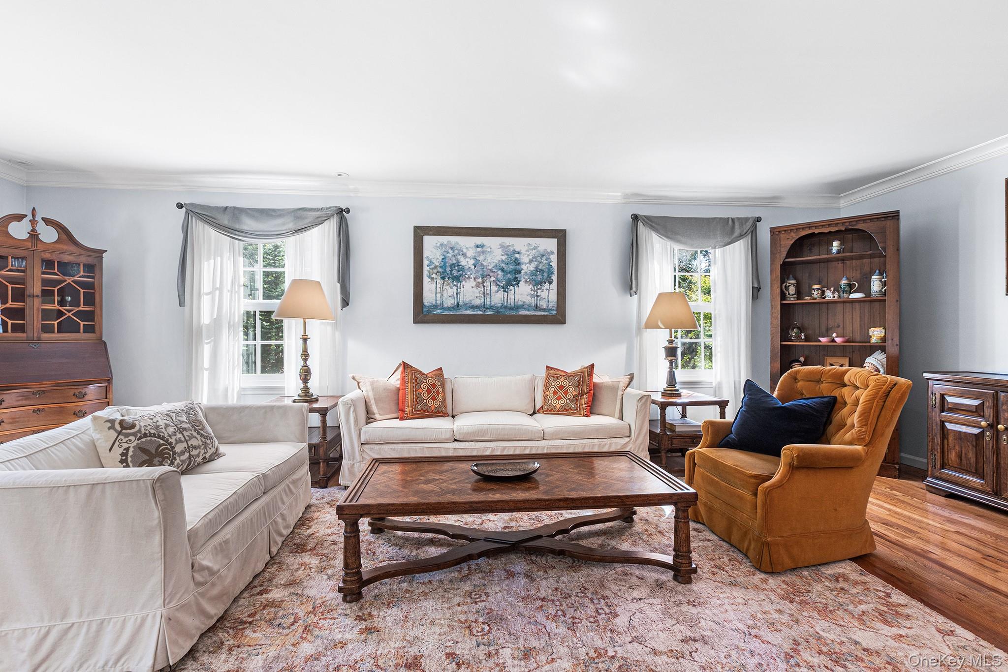 7 Byram Meadows Road Armonk, NY 10504 - Photo 3 of 32 a living room with furniture wooden floor and a table