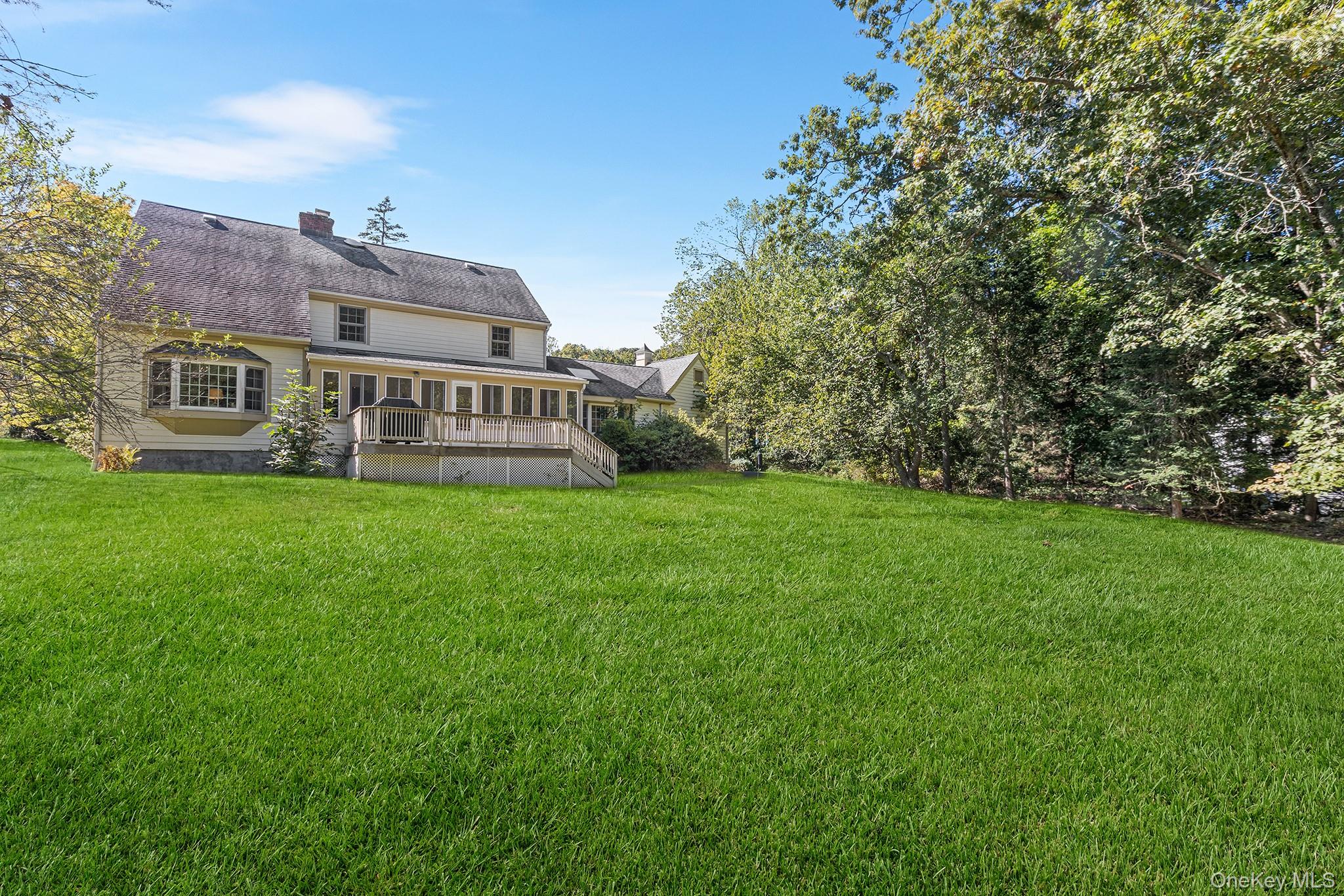 7 Byram Meadows Road Armonk, NY 10504 - Photo 31 of 32 a view of front of house with a yard
